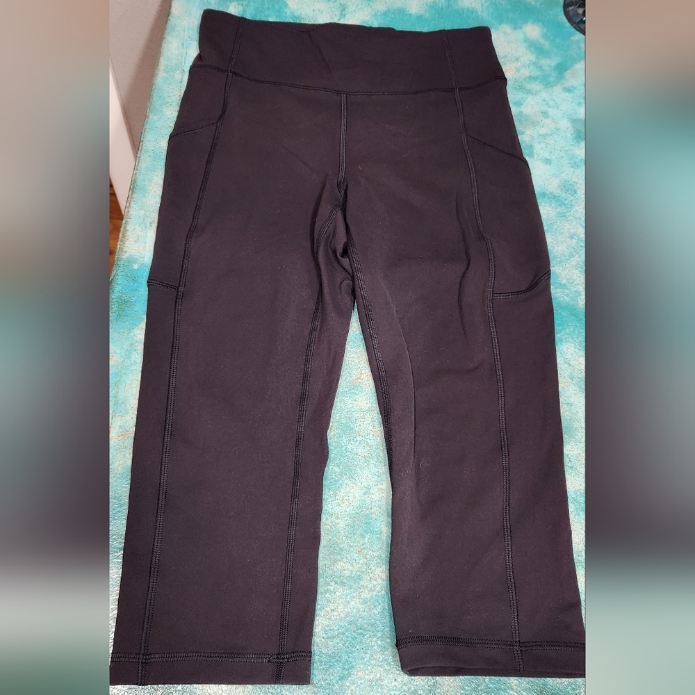 Lululemon Athletica Invigorate Crop, Black, Size 6. Well-loved.